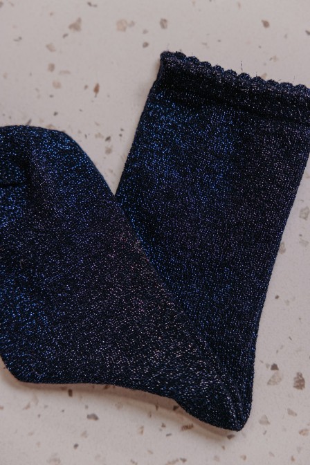 Chaussettes à paillettes posées.